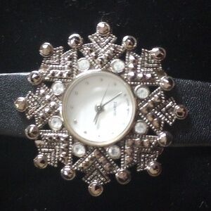 Vintage Avon Snow Burst watch